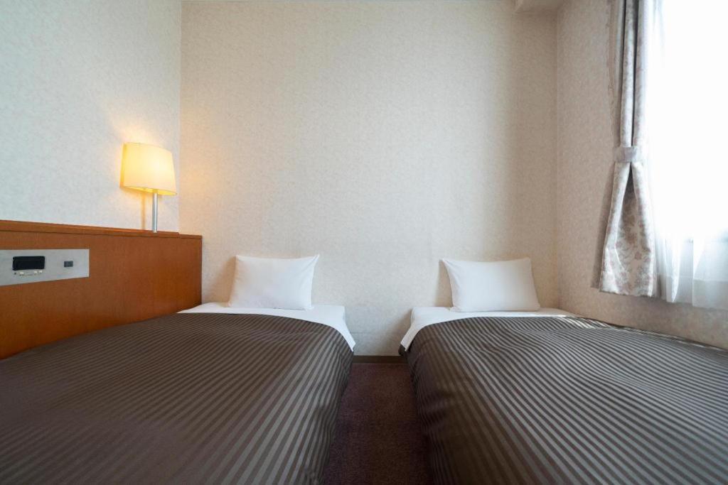 รอยัล โฮเทล อุโอะฮะชิ Hotel โทโยตะ ภายนอก รูปภาพ