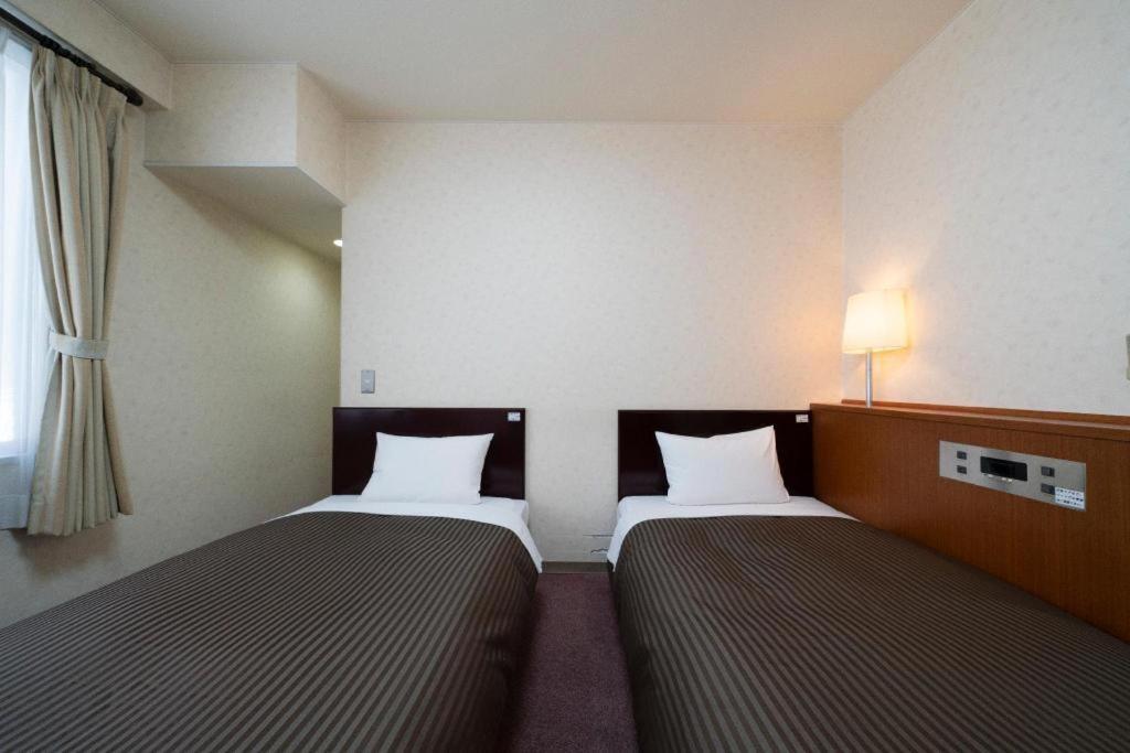 รอยัล โฮเทล อุโอะฮะชิ Hotel โทโยตะ ภายนอก รูปภาพ